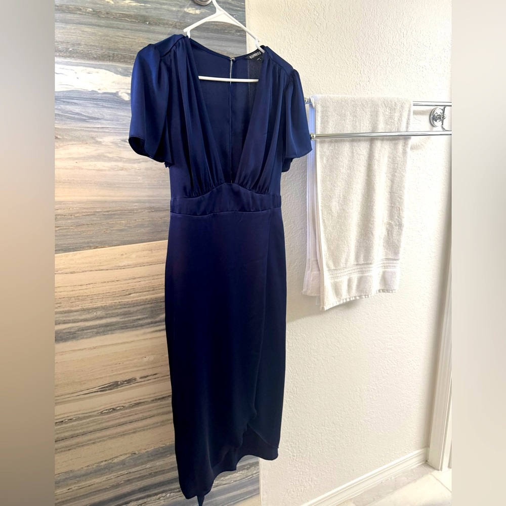 Express Blue Plunge neck flutter sleeve tulip skirt with hook and eye close. Med